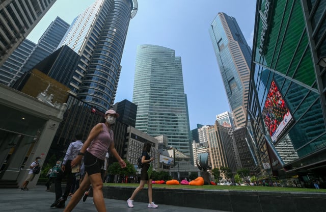 Singapore trims 2022 growth forecast on strong global headwinds