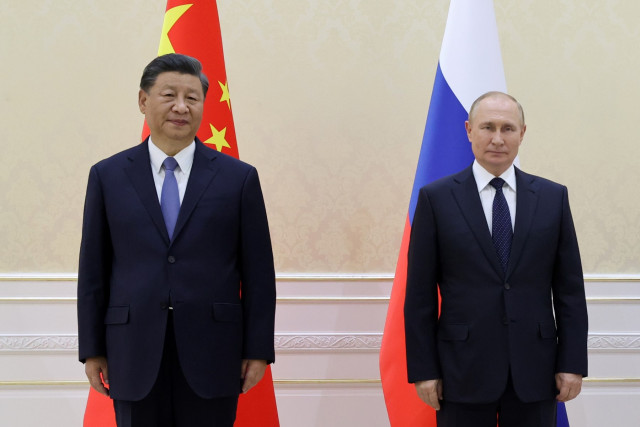 Putin, Xi hail 'great power' ties at talks defying West