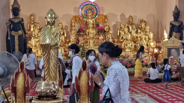 Why Wearing Hats is Not Allowed at Buddhist Pagodas?