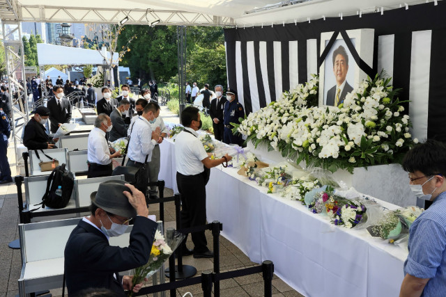 Japan honours assassinated Abe at controversial funeral