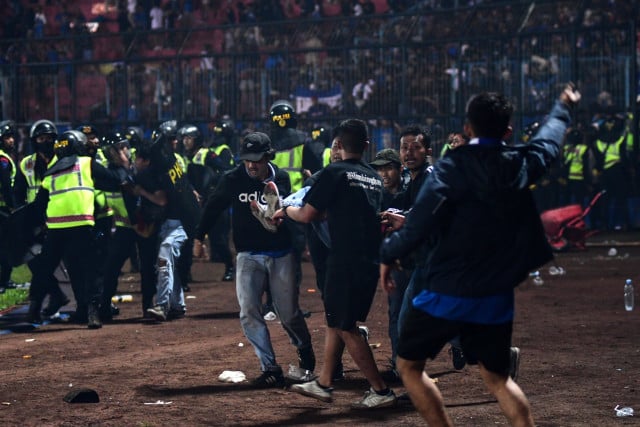 At least 129 dead after riot at Indonesia football match