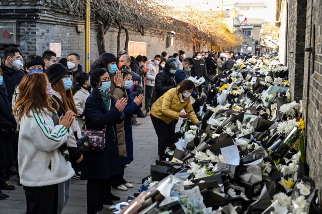 China's ruling party lauds late leader Jiang Zemin