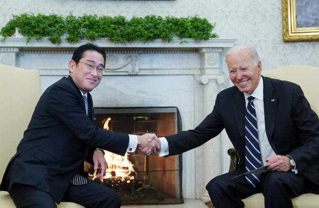 Japan PM tells Biden that new era requires more military muscle
