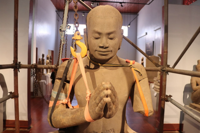 A Statue of the Legendary King Jayavarman VII Is Being Pieced Together