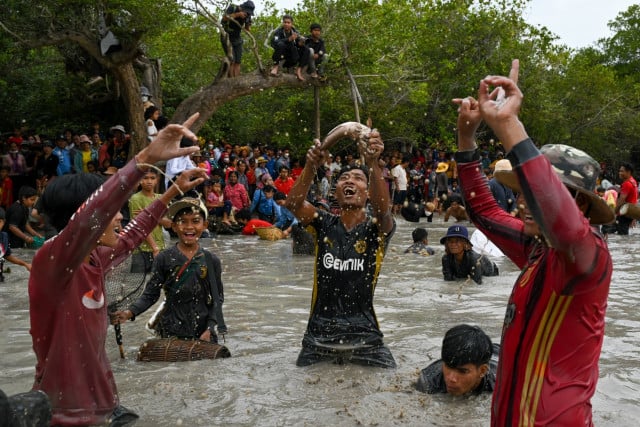 Cambodians celebrate traditional fishing methods at annual ceremony