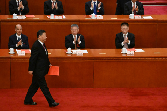 China's Xi handed historic third term as president