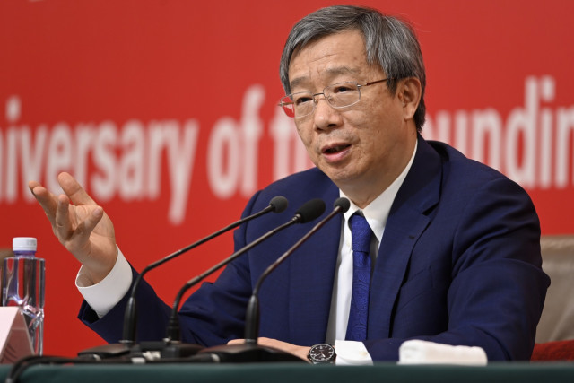 China retains central bank chief in unexpected move