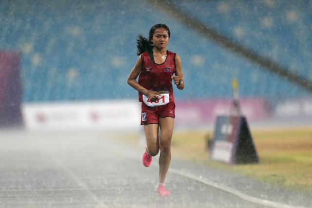 The Runner Awarded a Medal by the Rain  