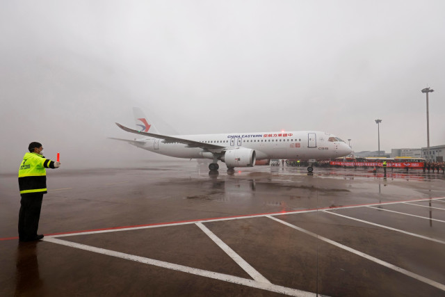 China's First Homegrown Passenger Jet Makes Maiden Commercial Flight 