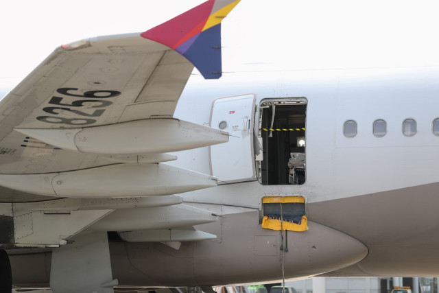 Asiana Airlines bans some emergency seats after door-opening accident