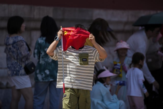 Chinese cities open air raid shelters for heat relief as extreme temperatures lead to deaths