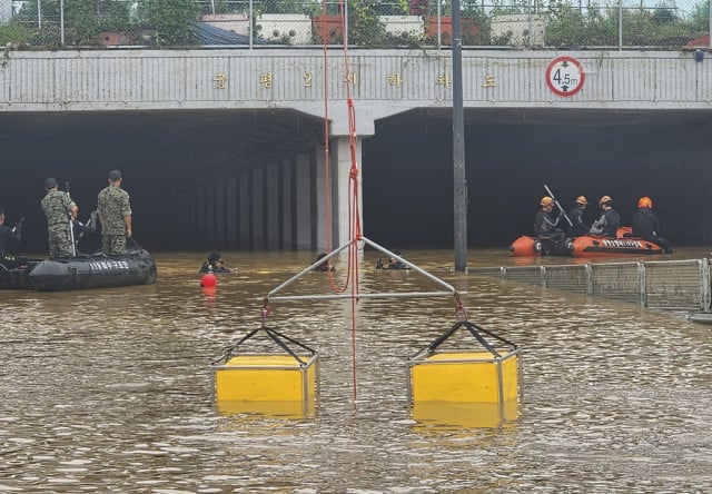 7 Bodies Pulled from Flooded Road Tunnel in South Korea as Rains Cause Flash Floods and Landslides