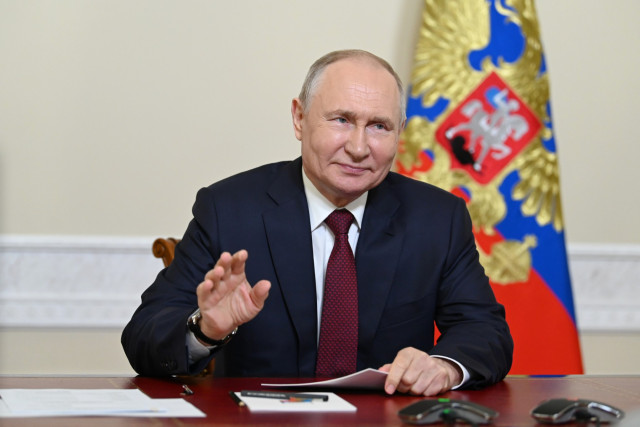 Putin defends arrests of critics during 'armed conflict' with Ukraine