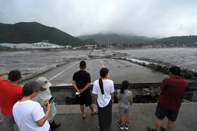 Beijing Rains Heaviest Since Records Began 140 Years ago