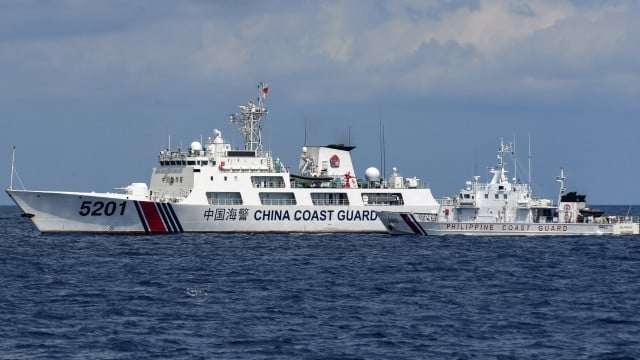 Philippines accuses China Coast Guard of firing water cannon at its boats