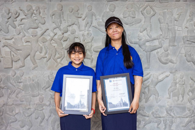 From Work at a Garbage Site to Studying in Australia, Malita and Leang Are Set on Building their Future through Studies