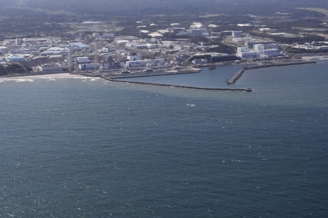Fukushima operator says released water samples within safe limits